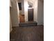 Entryway featuring wood floors, staircase, and a dark front door at 2720 Knightsbridge Rd, Henderson, NV 89074