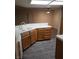 Spacious kitchen boasts white countertops, sink, and wood cabinets at 2720 Knightsbridge Rd, Henderson, NV 89074