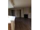 View of a living area with a fireplace and window coverings at 2720 Knightsbridge Rd, Henderson, NV 89074