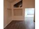Bright living room boasts modern gray flooring, neutral walls, and multiple windows at 2720 Knightsbridge Rd, Henderson, NV 89074
