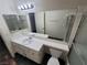 Clean bathroom design featuring sink and tiled shower, perfect for a quick refresh at 2761 Lodestone Dr # 63, Las Vegas, NV 89117
