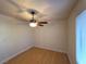 Bedroom featuring a ceiling fan and a window is move-in ready at 2761 Lodestone Dr # 63, Las Vegas, NV 89117