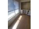 Bedroom features built-in shelving and storage, with wood look flooring at 2761 Lodestone Dr # 63, Las Vegas, NV 89117