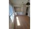 Bedroom includes ceiling fan, wood-look flooring and built-in shelving at 2761 Lodestone Dr # 63, Las Vegas, NV 89117