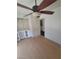Bedroom includes ceiling fan, wood-look flooring and built-in shelving at 2761 Lodestone Dr # 63, Las Vegas, NV 89117