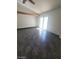 Bonus room includes tile flooring, beamed ceiling and access to an outdoor patio at 2761 Lodestone Dr # 63, Las Vegas, NV 89117