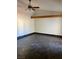 Open bonus room has beamed vaulted ceiling and tile floors at 2761 Lodestone Dr # 63, Las Vegas, NV 89117