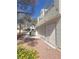 Exterior photo of a multi-level property featuring well maintained landscaping and natural light at 2761 Lodestone Dr # 63, Las Vegas, NV 89117