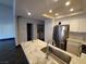 Updated kitchen with marble counters and stainless steel appliances is move-in ready at 2761 Lodestone Dr # 63, Las Vegas, NV 89117