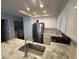 Bright kitchen featuring white cabinets, stainless steel appliances, and marble countertops at 2761 Lodestone Dr # 63, Las Vegas, NV 89117