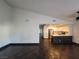 Spacious living room with hardwood floors and a vaulted ceiling at 2761 Lodestone Dr # 63, Las Vegas, NV 89117