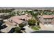 Lovely home with a green lawn, a pool, and mature trees, nestled in a Gathering-friendly neighborhood at 2785 Rosenhearty Dr, Henderson, NV 89044