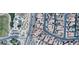 Aerial view of a property with a pool near a park featuring a splash pad and dog park in a residential neighborhood at 2785 Rosenhearty Dr, Henderson, NV 89044