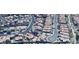 Expansive aerial view of a home with a private pool, nestled in a neighborhood with well-maintained landscaping at 2785 Rosenhearty Dr, Henderson, NV 89044