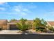 Charming single-story home with desert landscaping, a tile roof, and a two-car garage at 2917 Golf Links Dr, Las Vegas, NV 89134