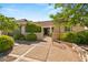 Beautiful home with a well-manicured yard and a stone walkway leading to the front door at 2917 Golf Links Dr, Las Vegas, NV 89134