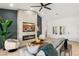Elegant living room with a sleek fireplace, modern furnishings, and plenty of natural light at 2917 Golf Links Dr, Las Vegas, NV 89134