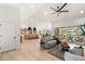 Open-concept living room with a spacious layout, modern decor, and patio access at 2917 Golf Links Dr, Las Vegas, NV 89134