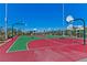 Outdoor basketball court featuring hoops and colorful surface, perfect for recreation at 3045 Camino Rico Ave, Henderson, NV 89044