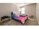 Bedroom featuring carpeted floors, neutral paint, and lots of natural light at 3045 Camino Rico Ave, Henderson, NV 89044