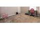 Spacious bedroom featuring plush carpet, a desk, and a comfortable chair at 3045 Camino Rico Ave, Henderson, NV 89044