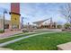 Beautiful community area featuring lush green lawns, shade structures and attractive foliage at 3045 Camino Rico Ave, Henderson, NV 89044