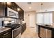 Well-equipped kitchen boasts modern appliances and ample counter space for cooking and entertaining at 3045 Camino Rico Ave, Henderson, NV 89044