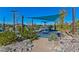 Community playground featuring a covered web swing and landscaping, perfect for Gathering fun at 3045 Camino Rico Ave, Henderson, NV 89044