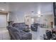 Spacious living room and dining area with tile floors, comfortable seating, and ample natural light at 320 Ellen Marie Dr, Las Vegas, NV 89110