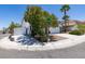 Charming single-Gathering home featuring a two-car garage and low-maintenance desert landscaping at 3336 Hidden Ridge St, Las Vegas, NV 89129