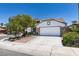 Charming single-Gathering home featuring a two-car garage and low-maintenance desert landscaping at 3336 Hidden Ridge St, Las Vegas, NV 89129