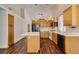 Bright kitchen features light wood cabinets and a center island at 3336 Hidden Ridge St, Las Vegas, NV 89129