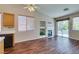 Living room with fireplace and sliding glass door to the patio at 3336 Hidden Ridge St, Las Vegas, NV 89129