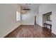 Inviting living room with wood floors, vaulted ceilings, and bright natural light at 3336 Hidden Ridge St, Las Vegas, NV 89129