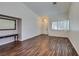 Inviting living room with wood floors, vaulted ceilings, and bright natural light at 3336 Hidden Ridge St, Las Vegas, NV 89129