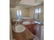 Bathroom vanity with dual sinks, granite countertops, mirrored wall and fixtures at 3480 E Hacienda Ave, Las Vegas, NV 89120