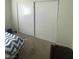 Bedroom with mirrored closet doors at 3480 E Hacienda Ave, Las Vegas, NV 89120