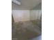 Bedroom featuring neutral walls, concrete floors and a mirrored wall to make the space appear larger at 3480 E Hacienda Ave, Las Vegas, NV 89120