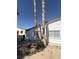 Exterior side view showcasing the home's backyard, including window details at 3480 E Hacienda Ave, Las Vegas, NV 89120