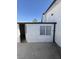Exterior view of the house with a door and window at 3480 E Hacienda Ave, Las Vegas, NV 89120