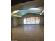Bright living room with views of the pool and vaulted ceilings, creating an airy space at 3480 E Hacienda Ave, Las Vegas, NV 89120