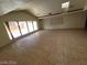 Bright living room with high ceilings, skylights, and pool views creates a relaxed atmosphere at 3480 E Hacienda Ave, Las Vegas, NV 89120