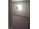 Bedroom featuring neutral carpet and a window for natural light, doorway view at 3601 Valley Forge Ave, Las Vegas, NV 89110