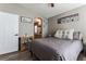 Comfortable bedroom boasts wood-look flooring and adjacent bathroom access at 3609 Indigo Flower St # 1, North Las Vegas, NV 89084