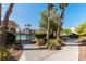 Community pool area offers a refreshing retreat with palm trees at 3609 Indigo Flower St # 1, North Las Vegas, NV 89084
