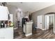 Kitchen with granite countertops, black appliances, and a view to the dining area at 3609 Indigo Flower St # 1, North Las Vegas, NV 89084