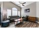 Light-filled living room with vaulted ceilings, plush seating, and modern decor at 3609 Indigo Flower St # 1, North Las Vegas, NV 89084
