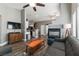 Open-concept living room with modern finishes, fireplace, and view into the kitchen at 3609 Indigo Flower St # 1, North Las Vegas, NV 89084