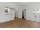 Bright living space with hardwood floors offers an open layout, connecting seamlessly to the kitchen and dining areas at 3609 Melonies Dr # 93, Las Vegas, NV 89103