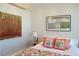 Cozy bedroom featuring unique artwork and comfortable bedding at 3750 Las Vegas Blvd # 4303, Las Vegas, NV 89158